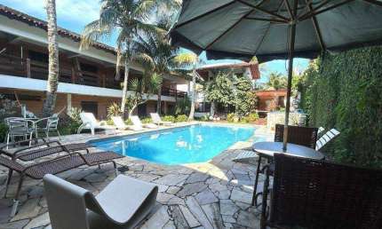 Pousada com 16 dormitórios à venda, 550 m² por R$ 4.000.000,00 - Praia de Pernambuco - Guarujá/SP