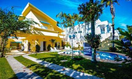 Casa com 4 dormitórios à venda, 347 m² por R$ 2.200.000,00 - Acapulco - Guarujá/SP