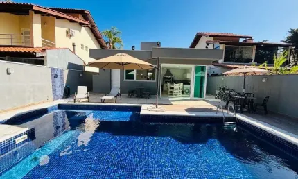 Casa com 3 suítes, 312 m² - venda ou aluguel/ano - Riviera de São Lourenço - Bertioga/SP