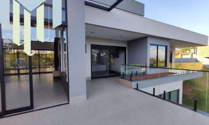 Casa á venda condomínio Portal da Serra com 04 suítes, escritório, toda automatizada ,vista para o vale, acabamento impecável.
