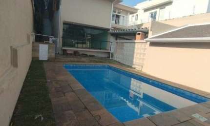 CASA COM PISCINA COM 3 QUARTOS SENDO 3 SUITES EDICULA CHURRASQUEIRA 4 VAGAS  SALAO DE FESTAS FL55