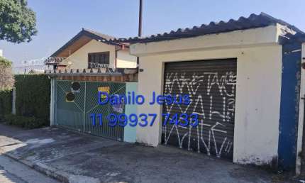 Casa com 2 dormitórios, 2 vagas e ponto comercial. FL51