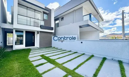 Casa com 3 quartos à venda na Lídia Hames Huller, 12, Forquilhas, São José por R$ 590.000