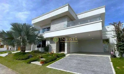 Em condomínio fechado, com terraço, mobiliada, 3 quartos sendo 1 suíte e 4 vagas