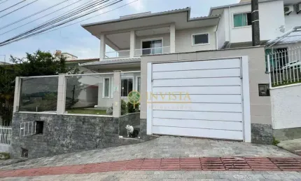 Semi mobiliado, 3 quartos, sendo 1 suíte e 2 vagas em Forquilhas - Á venda em São José