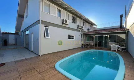 Espaço gourmet com acesso a piscina privativa, 5 quartos e 2 vagas à venda em coqueiros.
