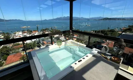 Vista mar, sacada com churrasqueira, terraço privativo com jacuzzi, 2 suítes e 2 vagas à venda em coqueiros.
