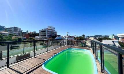 À venda em Coqueiros! Terraço privativo com piscina, vista Mar, 3 suítes e 3 vagas.