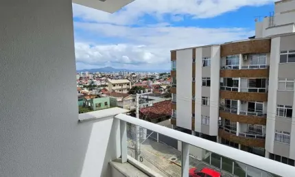 À venda em Capoeiras! Sacada com churrasqueira, vista Mar, 3 quartos e 1 vaga de garagem.