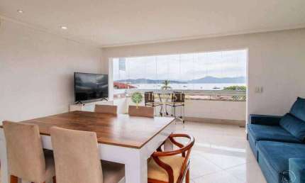 Apartamento com 3 quartos, sacada com churrasqueira, 150 metros da praia e com linda vista panorâmica para o Mar - À venda em Jurerê.