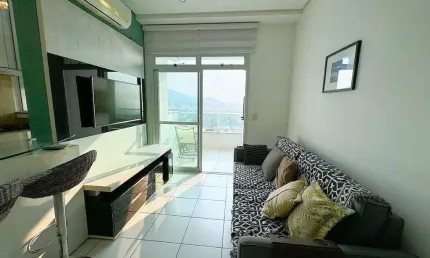 À venda no bairro itacorubi! vista mar, sacada com churrasqueira e 1 vaga de garagem.