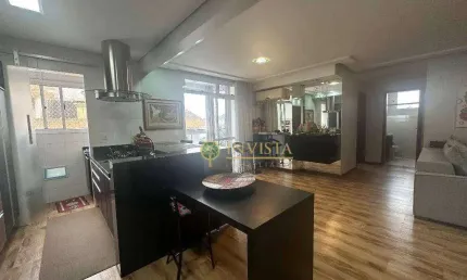 À venda no bairro estreito! sacada com churrasqueira, vista mar, 2 quartos e 1 vaga de garagem.