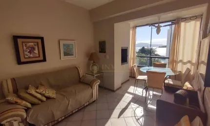 À venda | pé na areia, 63 m² 2 quartos, sacada com churrasqueira e vista mar, 1 vaga de garagem - praia de canasvieiras, em florianópolis.