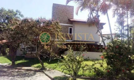 Locação | condomínio fechado, 490 m², acesso direto para praia, 4 quartos e 4 vagas de garagem - rio tavares, em florianópolis.