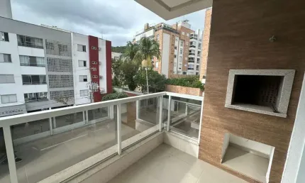 Locação | 90 m², 2 suítes, sacada com churrasqueira, semi mobiliado e 2 vagas - Córrego Grande, em Florianópolis.