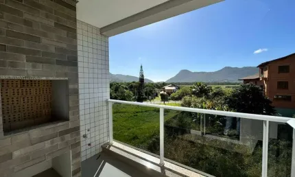 À venda | 48 m², sacada com churrasqueira, 2 quartos e 1 vaga de garagem - Praia dos Açores, em Florianópolis.