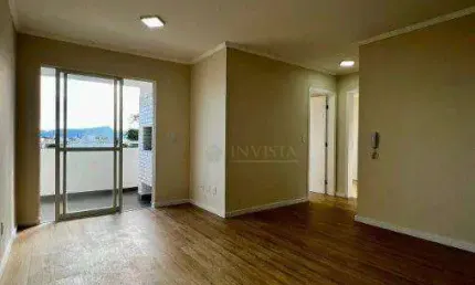 À venda | 58 m², 2 quartos, sacada com churrasqueira, vista Mar e 1 vaga de garagem - Balneário Estreito, Florianópolis.