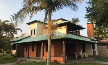 Casa à venda as margens do Rio Mampituba em Torres RS