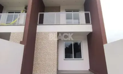 Casa geminada a venda no Bairro Centenário em Torres RS