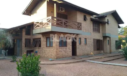 Casa com 06 quartos à venda no Bairro Centenário em Torres RS