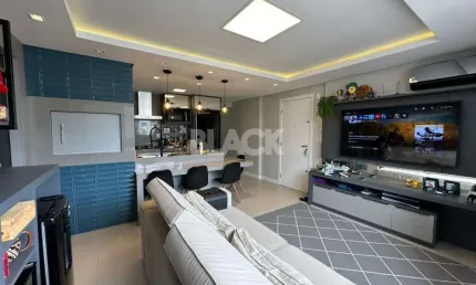 Apartamento mobiliado com 2 suítes à venda no predial em torres rs