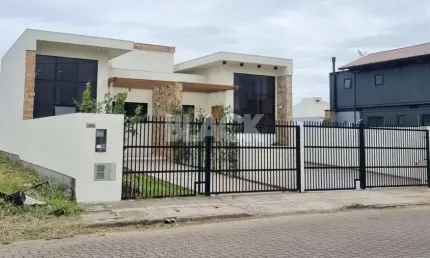 Casa geminada térrea no Morada das Palmeiras em Torres RS