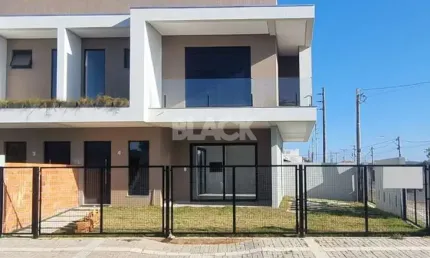 Sobrado geminado com pátio no morada das palmeiras em torres rs