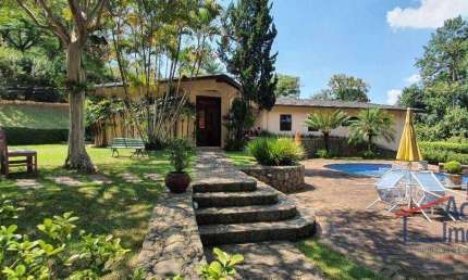 GRANJA VIANA - COND.JD.MEDITERRÂNEO - Casa térrea com 4 suites e lazer