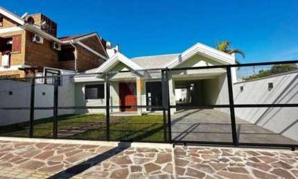 Casa com 3 dormitórios, 280 m² - venda ou aluguel - Dom Feliciano - Gravataí/RS