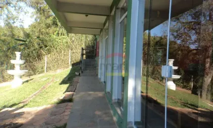 CASA NO CONDOMÍNIO ALPES DA CANTAREIRA, 4 SUÍTES, 5 VAGAS, COM LAZER