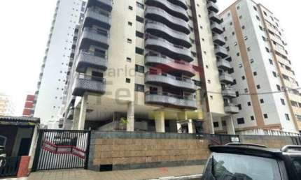 APARTAMENTO NA VILA TUPI A 350 METROS DA PRAIA COM 2 DORMITÓRIOS, SENDO1 SUÍTE, 2 VARANDAS E 1 VAGA