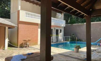 CASA EM CONDOMÍNIO ALPES DA CANTAREIRA, COM 5 DORMITÓRIOS, SENDO 4 SUÍTES, 8VGS PISCINA