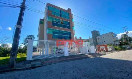 Apartamento com 2 dormitórios para alugar, 64 m² por R$ 2.652,37/mês - Praia de Fora - Palhoça/SC