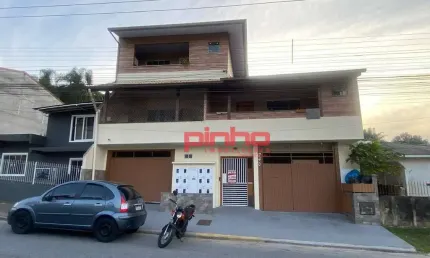 Apartamento com 1 dormitório para alugar, 50 m² por R$ 1.344,80/mês - Forquilhas - São José/SC