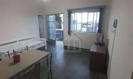 Apartamento para venda com sacada e vaga de garagem no Guarujá/SP
