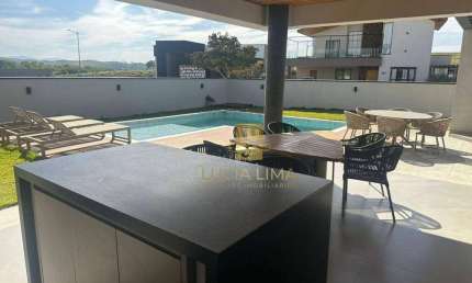 Sobrado MAGNÍFICO com PISCINA,  5 SUÍTES,  400 m² - venda por R$ 3.500.000 ou ALUGUEL por R$ 22.000/mês - Condomínio Colinas do Paratehy/SP