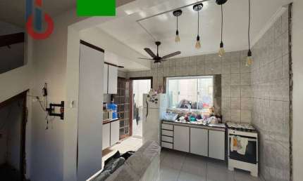 Village com 2 dormitórios para alugar, 75 m² por R$ 2.800,00/mês - Centro - Bertioga/SP
