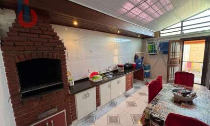 Village com 3 dormitórios à venda, 157 m² por R$ 699.000,00 - Centro - Bertioga/SP