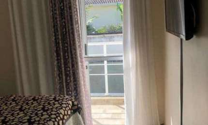 Casa em condomínio fechado com 2 quartos à venda na Rua Joaquim Aurélio Nabuco de Araújo, Cidade Jardim, Caraguatatuba, 101 m2 por R$ 426.000