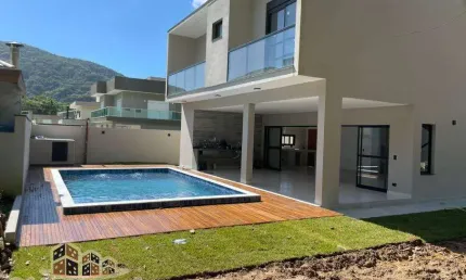 Casa em condomínio fechado com 4 quartos à venda na praia da lagoinha, ubatuba  por r$ 1.700.000