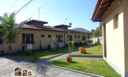 Casa em condomínio fechado com 2 quartos à venda no Martim de Sá, Caraguatatuba  por R$ 320.000
