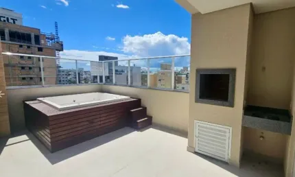 COBERTURA COM DOIS QUARTOS NA PRAIA GRANDE COM JACUZZI