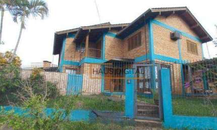 Casa com 4 dormitórios, 162 m² - venda por R$ 1.500.000,00 ou aluguel por R$ 5.525,00/mês - Cristo Rei - São Leopoldo/RS