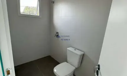 Geminado com 3 dormitorios sendo 1 suite e 2 vagas no Bairro Espinheiros em Itajai