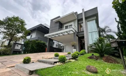 CASA COM 4 SUÍTES MOBILIADA E DECORADA NO CONDOMÍNIO ALPHAVILLE EM GRAVATAÍ/RS