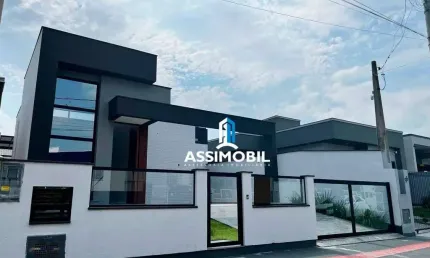 Casa com 3 dormitórios à venda, 112 m² por R$ 665.000,00 - Caminho Novo - Palhoça/SC