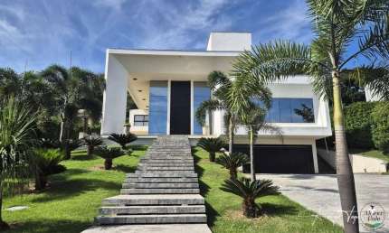 Sobrado moderno de alto padrão à venda no Aldeia do Vale com 4 suítes, vista definitiva e lazer completo