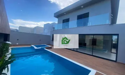 MARAVILHOSA CASA ALTO PADRÃO EM CONDOMÍNIO FECHADO com 4 dormitórios à venda, 304 m² por R$ 2.700.000,00 - Massaguaçu - Caraguatatuba/SP