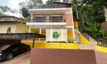 Casa com 3 dormitórios à venda, 121 m² por R$ 900.000,00 - Martim de Sá - Caraguatatuba/SP