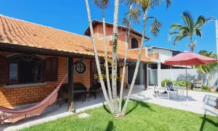 Casa em condomínio fechado com 4 quartos à venda na servidão caminho dos surfistas, campeche, florianópolis, 144 m2 por r$ 2.690.000